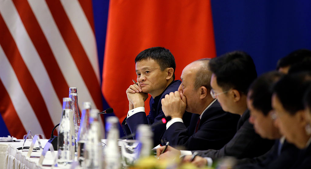 SEATTLE, WA - SEPTEMBER 23: Jack Ma, CEO of Alibaba listens as Chinese President Xi Jinping speaks at a U.S.-China business roundtable, comprised of U.S. and Chinese CEOs on September 23, 2015, in Seattle, Washington. The Paulson Institute, in partnership with the China Council for the Promotion of International Trade, co-hosted the event. (Photo by Elaine Thompson-Pool/Getty Images)