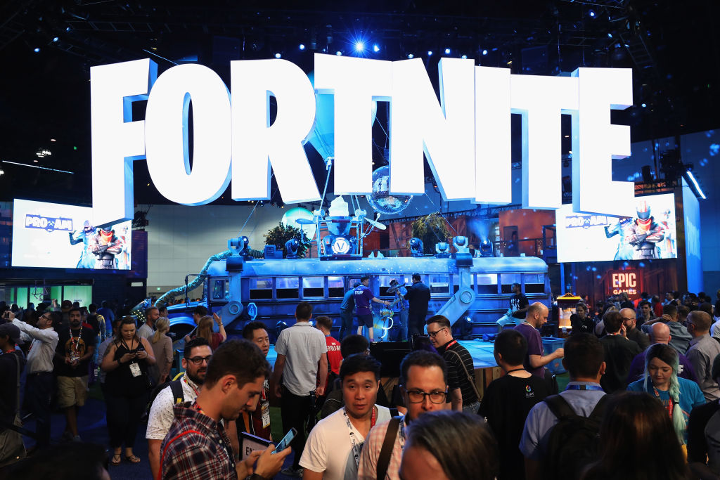 LOS ANGELES, CA - JUNE 12:  Game enthusiasts and industry personnel visit the 'Fortnite' exhibit during the Electronic Entertainment Expo E3 at the Los Angeles Convention Center on June 12, 2018 in Los Angeles, California.  (Photo by Christian Petersen/Getty Images)
