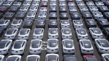 Tesla vehicles in a parking lot after arriving at a port in Yokohama, Japan. Photographer: Toru Hanai/Bloomberg