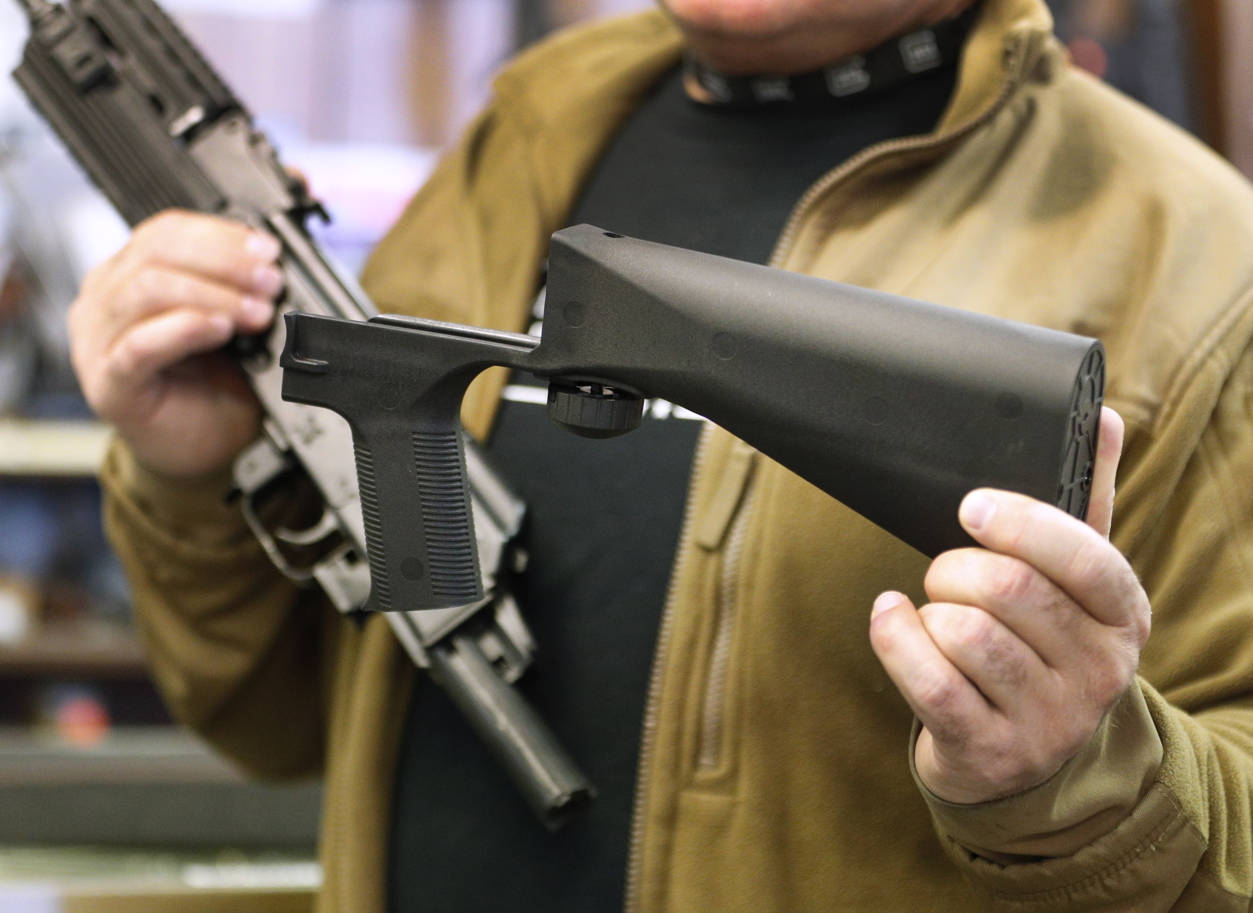 Um dispositivo "bump stock" que cabe em um rifle semiautomático (George Frey/Getty Images)