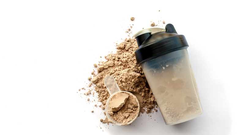 Pó de proteína whey com shaker para misturar”.