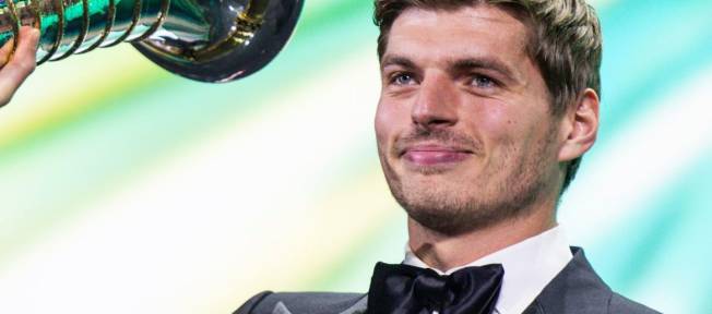 KIGALI, RWANDA - DECEMBER 13: In this handout provided by Federation Internationale de l'Automobile (FIA), F1 Champion Max Verstappen of Netherlands and Oracle Red Bull Racing receives the 1st position award during the FIA Awards 2024 on December 13, 2024 in Kigali, Rwanda. (Photo by Handout/FIA/DPPI via Getty Images )