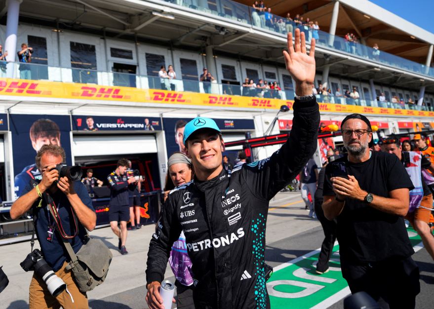 Formula One F1 - Canadian Grand Prix - Circuit Gilles Villeneuve, Montreal, Quebec, Canada - June 14, 2025 Mercedes' George Russell celebrates after qualifying in pole position REUTERS/Mathieu Belanger TPX IMAGES OF THE DAY