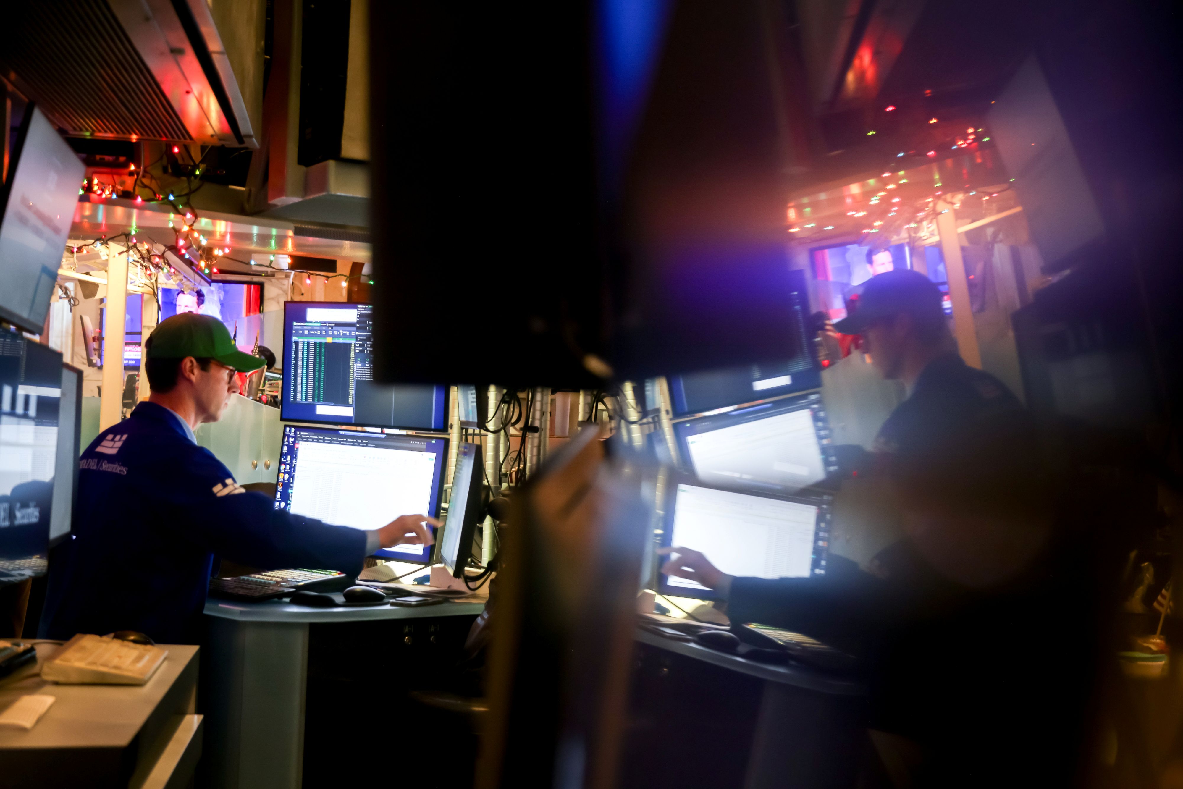 A trader works on the floor of the New York Stock Exchange (NYSE) in New York. Photographer: Michael Nagle/Bloomberg
